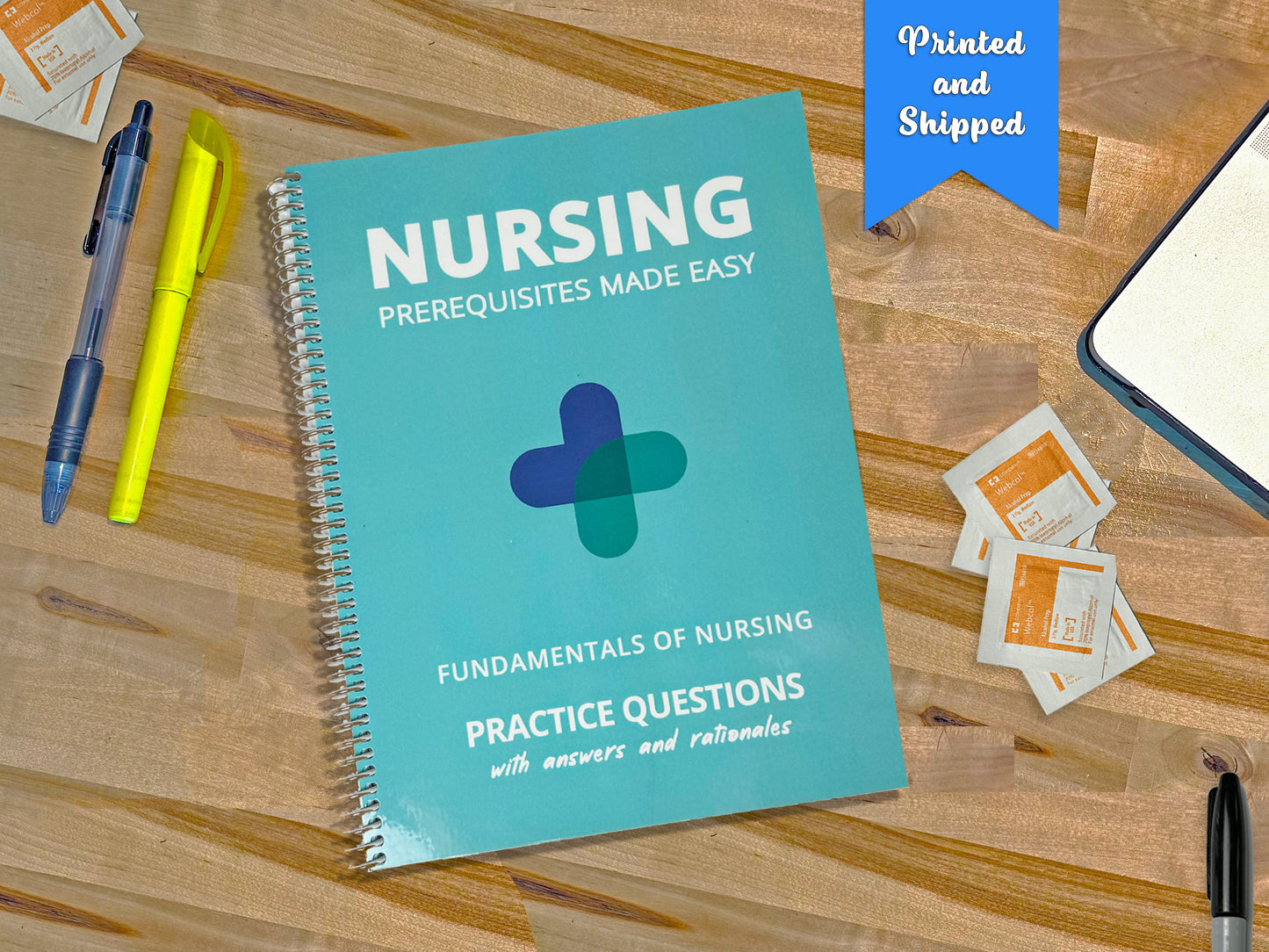 Printed Fundamentals of Nursing Practice Questions book on a desk. Comprehensive study guide featuring essential practice questions for nursing students, designed to enhance learning and exam preparation.